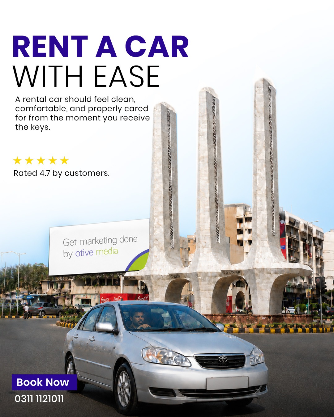 Silver rental sedan near the Teen Talwar landmark in Karachi